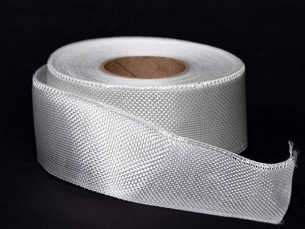 A roll of fiberglass cloth tape with white color.