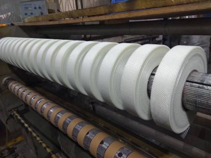 Advanced fiberglass tape production machine.