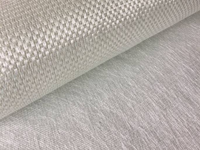 A roll of fiberglass combo mat with gray color.