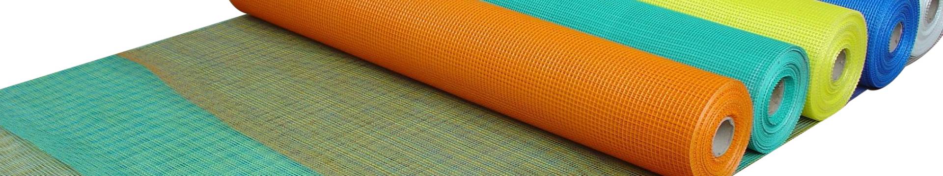 There are five rolls of fiberglass mesh with various colors.
